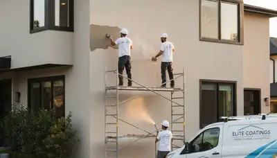 Professional stucco repair and exterior painting on Austin, TX home walls by skilled contractors